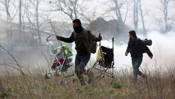 Greek police, migrants clash for third day