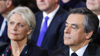 Former French PM Fillon and wife to stand corruption trial