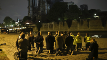 Tourist mecca Notre Dame also revered as place of worship