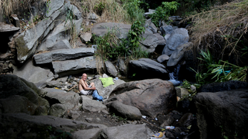 Mountain park becomes public bath amid Venezuela crisis