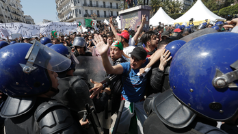 Algerian constitutional council head quits; students march