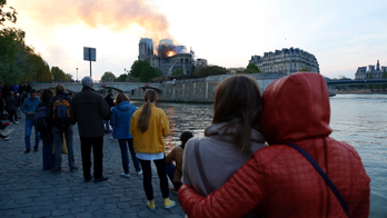 In Notre Dame fire, embers of unity for a fractured France