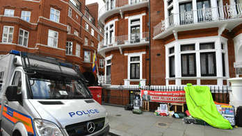 The Latest: Russia urges UK to observe Assange's rights