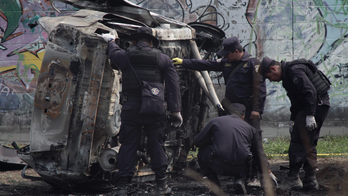 2 police wounded by bomb in car in El Salvador's capital