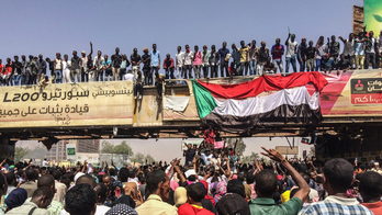 The Latest: Sudan army deploys in capital amid coup rumors