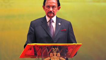 Brunei invokes laws allow stoning for gay sex, adultery