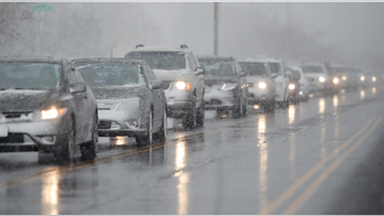 The Latest: Spring snowstorm moving into Great Lakes region