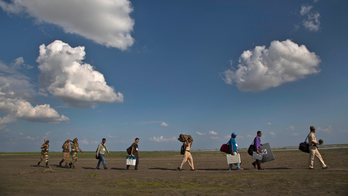 Poll workers journey to reach India's most remote voters