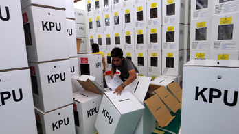 Indonesians wrestle with voting choices, giant ballot papers