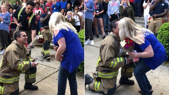 Fireman surprises teacher girlfriend with a proposal during school fire drill