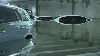 Garage floods at Dallas Love Field amid heavy rains, leaves dozens of cars partially submerged