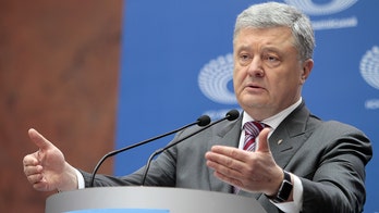 Former Ukrainian President Poroshenko says Putin is 'war criminal' guilty of 'crimes against humanity'