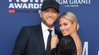Cole Swindell appears on red carpet with rumored girlfriend Kelly Kelly