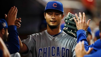 Yu Darvish's fastball pinballs off Miami Marlins batter, Cubs catcher and home plate umpire