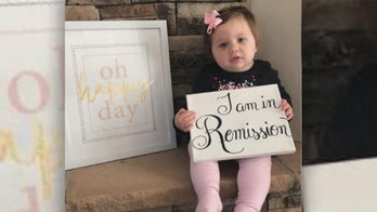 Kentucky toddler beats stage 4 cancer, poses for photos