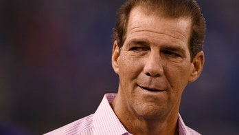 Baltimore Ravens owner commits $100G to help rebuild churches ruined in arson attacks