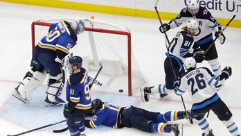 Connor scores in OT as Jets beat Blues 2-1 to even series