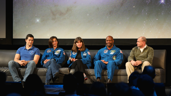 Astronauts hope to share space experience with all Earthlings, panel says