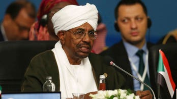 Brothers of ousted Sudanese ruler arrested, but protesters refuse to leave military headquarters