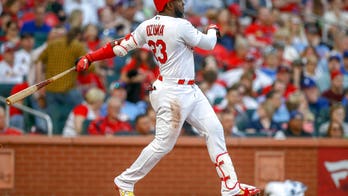 St. Louis Cardinals' Marcell Ozuna face plants after overestimating fly ball
