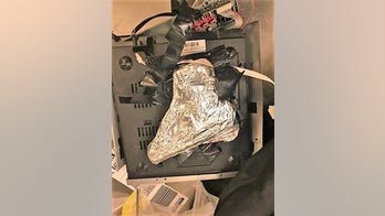 TSA finds handgun concealed inside DVD player in passenger’s checked bag