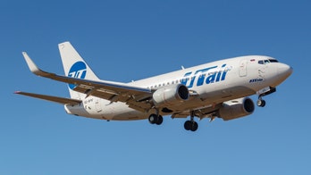 Airline passengers open emergency exit on Utair flight after seeing flames coming from engine