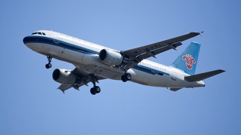 Another airline passenger tosses coins at plane for good luck, gets whole flight delayed