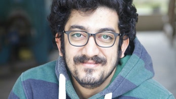 Jailed Iranian musician rebuffs regime's ban by releasing album about war and oppression