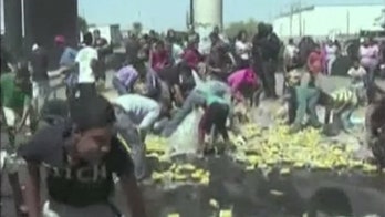 Beer truck overturns in Mexico, spilling cans onto roadway -- and causing rush for free alcohol
