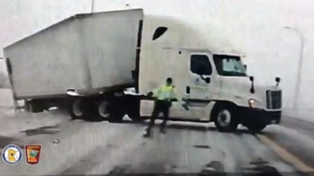 Minnesota’s high winds send trooper tumbling to the ground, video shows