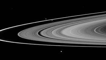 Weirdly colored Saturn moons linked to ring features, NASA's Cassini revealed