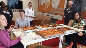 Patient's request for pizza on hospital window gets great response