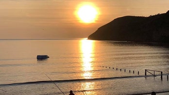 Aquavan? Van submerged after owner parks it on beach just before high tide