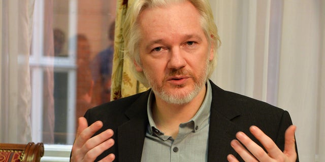 LONDON, ENGLAND - AUGUST 18: WikiLeaks founder Julian Assange speaks during a press conference, where he confirmed he "will be leaving the embassy soon", in the Ecuadorian Embassy on August 18, 2014 in London, England. Mr Assange has been living in the embassy since June 2012 in an attempt to avoid extradition to Sweden where he faces allegations of sexual assault. (Photo by John Stillwell - WPA Pool/Getty Images)