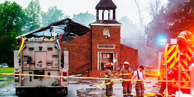FILE: Firefighters and fire investigators responding to a fire at Mt. Pleasant Baptist Church Thursday, April 4, 2019, in Opelousas, La.