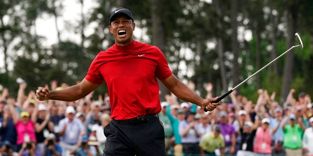 Tiger Woods reacts as he wins the Masters golf tournament Sunday, April 14, 2019, in Augusta, Ga. (AP Photo/David J. Phillip)