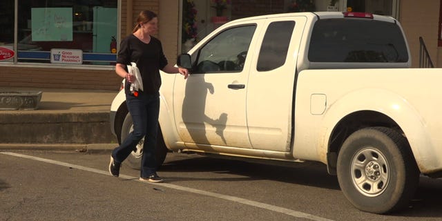 Houston, Miss. resident, Jenny Little, walks to her vehicle after picking up her prescription at a local pharmacy. She recently had to drive to two different hospitals outside of town to get emergency care. (Fox News/ Charles Watson)