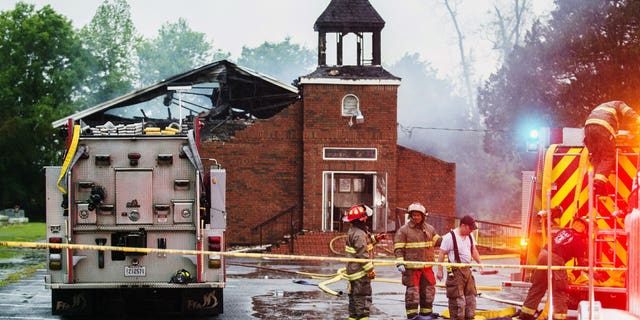 Firefighters and fire investigators respond to a fire at Mt. Pleasant Baptist Church Thursday, April 4, 2019, in Opelousas, La. Authorities in southern Louisiana are investigating a string of "suspicious" fires at three African American churches in recent days. Fire Marshal H. "Butch" Browning said it wasn't clear whether the fires in St. Landry Parish are connected and he declined to get into specifics of what the investigation had yielded so far but described the blazes as "suspicious."