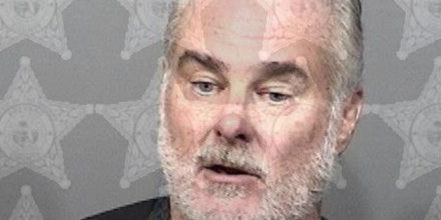 Thomas Devaney Lane has been charged with disturbing the peace, resisting arrest without violence and misusing 911.