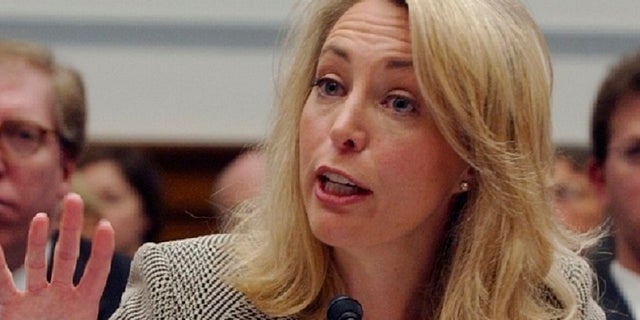 Former CIA operative Valerie Plame gestures while testifying on Capitol Hill, in an undated photo. (Associated Press)