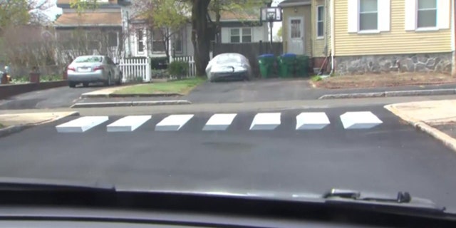 An optical illusion for drivers. The walkway was designed by a pair of fourth graders in Massachusetts. (WBZ / NNS)