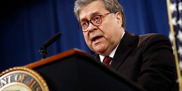 Attorney General William Barr speaks about the release of an edited version of Special Counsel Robert Mueller's report during a news conference April 18, 2019, at the Department of Justice in Washington.