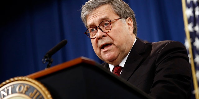 Attorney General William Barr speaks about the release of a redacted version of Special Counsel Robert Mueller's report during a news conference April 18, 2019, at the Department of Justice in Washington.