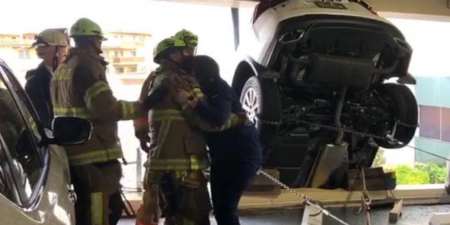 Fire rescue crews were able to secure the vehicle and get the driver out of the SUV.