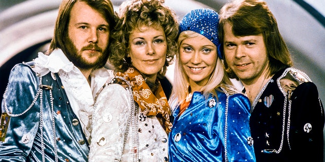 Swedish pop legends ABBA pose in their 1974 heyday. They've promised to release new music in fall 2019.