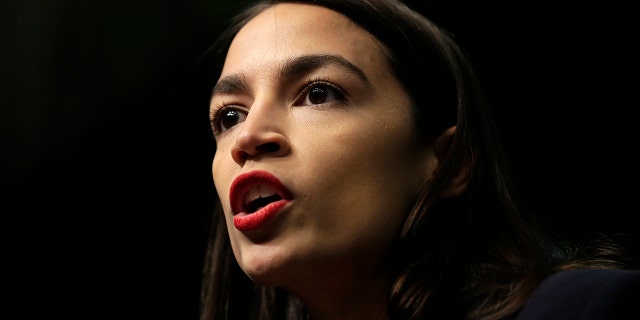 Rep. Alexandria Ocasio-Cortez, D-N.Y., speaks during the National Action Network Convention in New York, Friday, April 5, 2019. (AP Photo/Seth Wenig)