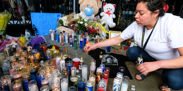 An enormous memorial in Nipsey Hussle's honor has sprung up in front of his clothing store, The Marathon, where he was shot
