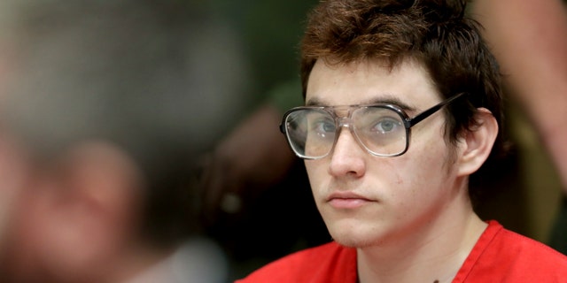 Parkland school suspect Nikolas Cruz listens during a hearing at the Broward Courthouse in Fort Lauderdale, Fla., Friday.