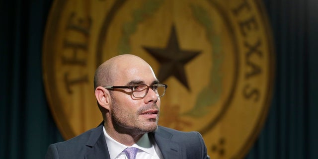 Texas Rep. Dennis Bonnen, R-Angleton, talks to the media at the Texas Capitol in Austin, Texas. A Texas gun rights activist drove to the homes of Republican legislators he blamed for stalling proposals to expand gun laws, prompting state troopers to monitor Bonnen's, the now House speaker, family residence. (Associated Press)
