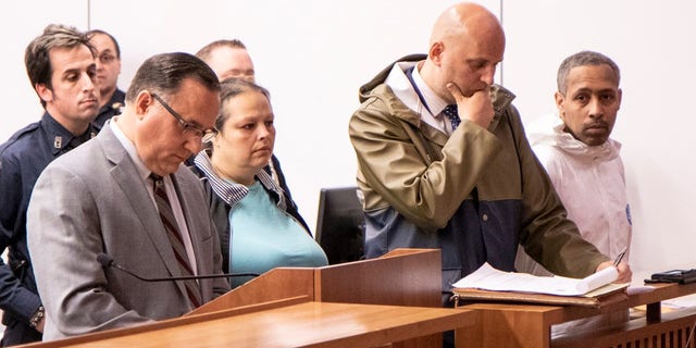 Michael Cammarata, far right, and his girlfriend Ayisha Egea, center, were arraigned together in Staten Island Criminal Court in St. George on Friday.